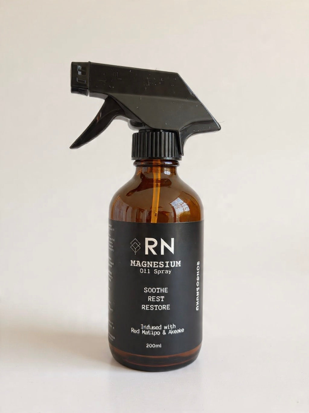 Brown spray bottle of RN Mg oil spray