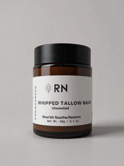 Unscented 60g amber jar of whipped tallow balm with white product label 