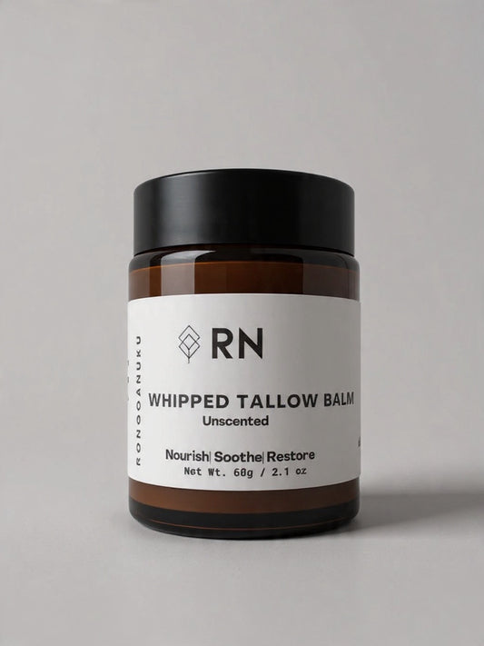 Unscented 60g amber jar of whipped tallow balm with white product label 