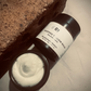 Open jar of whipped tallow balm with labelled jar beside it