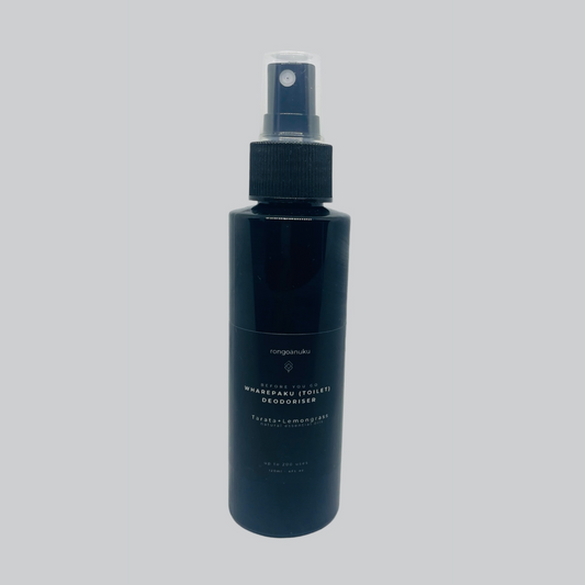 Sleek black spray bottle of wharepaku deodoriser 120ml